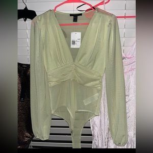 Green long sleeve semi sheer bodysuit. Size small. NEW.
